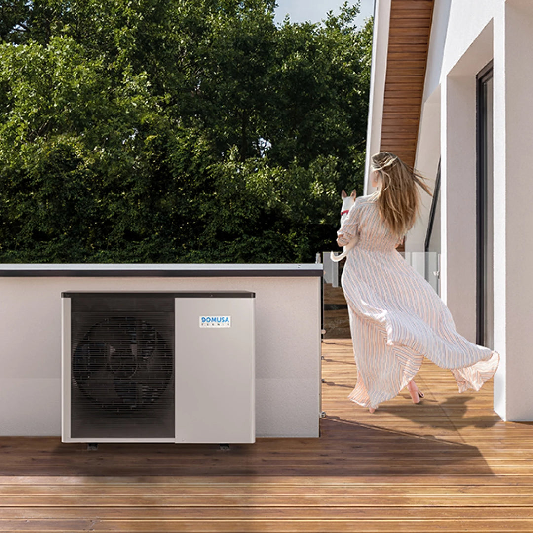 Domusa Dual Clima R and R EC heat pump next to a house terrace