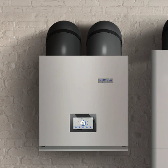 Domusa NanoClima 4 mounted on an indoor wall with its two 250 mm air ducts